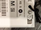 a white tag that is attached to a black cord