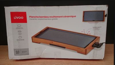 une boîte sur laquelle figure l'image d'un ordinateur portable