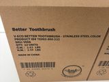 a box of toothbrushes sitting on top of a table