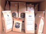 many bags of tea sitting in a cardboard box