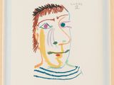 an image of a drawing of a man ' s face in a wooden frame