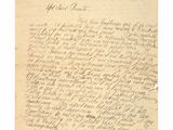 une lettre écrite à l'encre noire sur une feuille de papier
