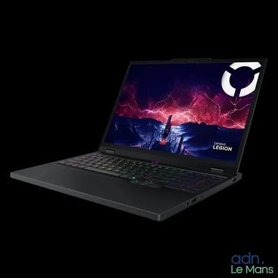 the laptop is open on a black background with a dark background