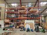 a large warehouse filled with lots of different types of wood