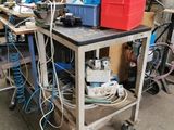 a workbench with a lot of tools on it