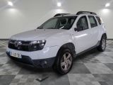 a picture of a white dacia parked in a garage