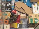 a pile of boxes and boxes on the floor of a store