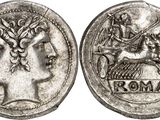 une pièce d'argent sur laquelle figurent le portrait d'une femme et un cheval