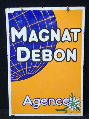 panneau jaune et bleu portant l'inscription « Magnat Debon »