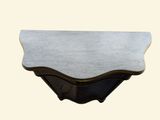 an image of a white marble shelf with a black frame