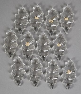 these are some very pretty glass flowers that are on a wall