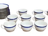 a lot of cups and a stack of plates