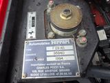 a close up of a car engine with a label on it