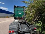 a truck that is parked on the side of the road
