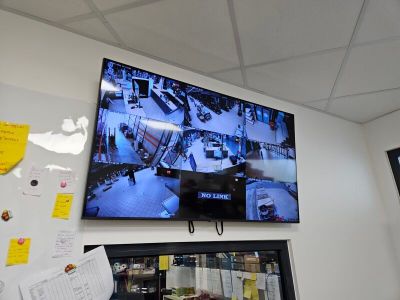 a television mounted on the wall in a room