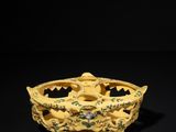 an image of a yellow bowl with a dragon on it