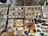 many different types of rocks and other items on the table
