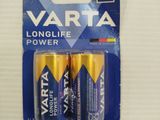 two batteries that are sitting on top of each other