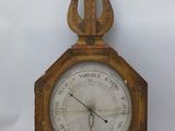 a clock that is sitting on a white table