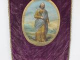 an image of a purple banner with a picture of a man holding a cat