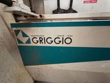 a sign that says grigio on the side of a boat