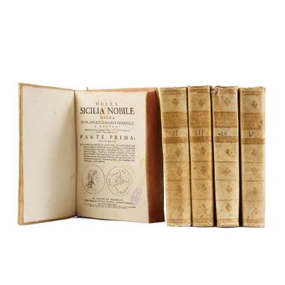 six books in a row on a white surface with a white background