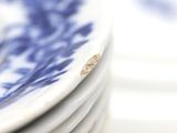 a lot of plates stacked on top of each other