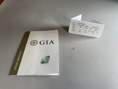 a book with a picture of a green diamond on it