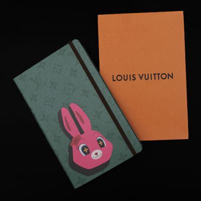 louis vuitton notebook with a pink bunny face on the cover