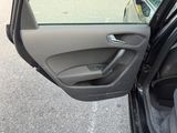 a car door open with the driver ' s side door open