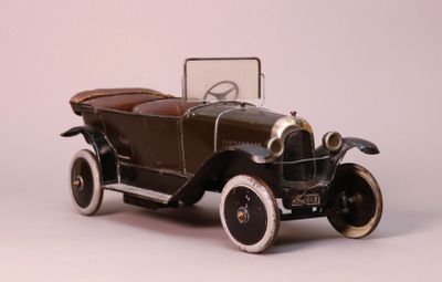 a toy car that is sitting on a white surface