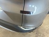 a close up of a car ' s bumper with a sticker on it