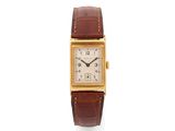 une montre-bracelet rectangulaire en or 18 carats avec un bracelet en cuir marron
