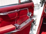 a close up of a red and white car door