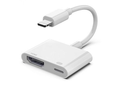 Gros plan sur un adaptateur USB-HDMI posé sur une surface blanche
