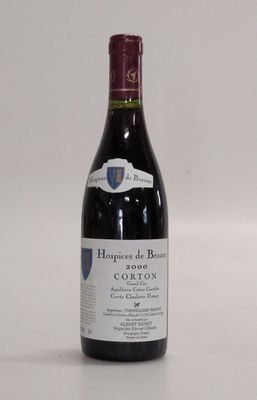 a bottle of wine that is sitting on a table