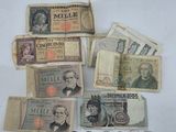 a lot of old money and coins on the table