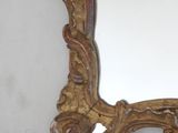 a mirror that is hanging on the wall