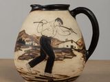 a vase with a picture of a man playing golf on it