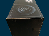 a black box with a picture of a clock inside of it