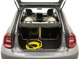 the back of a car with its trunk open and a hose in the trunk