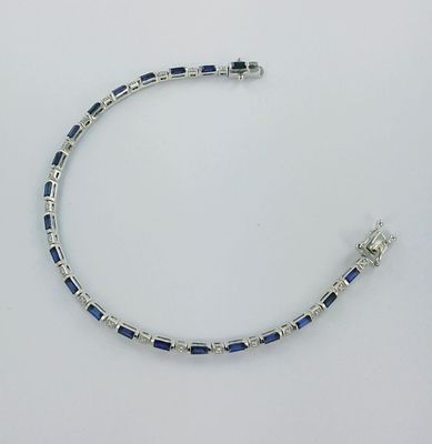 bracelet en argent sterling orné de perles de verre bleues et d'un fermoir