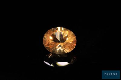 a yellow diamond on a black background
