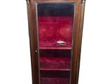 an image of a wooden cabinet with a glass door