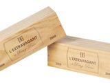 two wooden boxes of wine are stacked on top of each other
