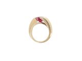 a close up of a gold ring with a pink stone
