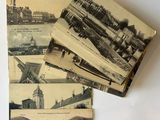 several old postcards of different types of buildings on a white surface