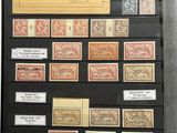 an image of a collection of stamps on display in a glass case