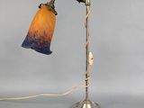 an image of a table lamp with a glass shade on it
