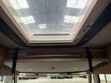 a view of the inside of a vehicle with a skylight